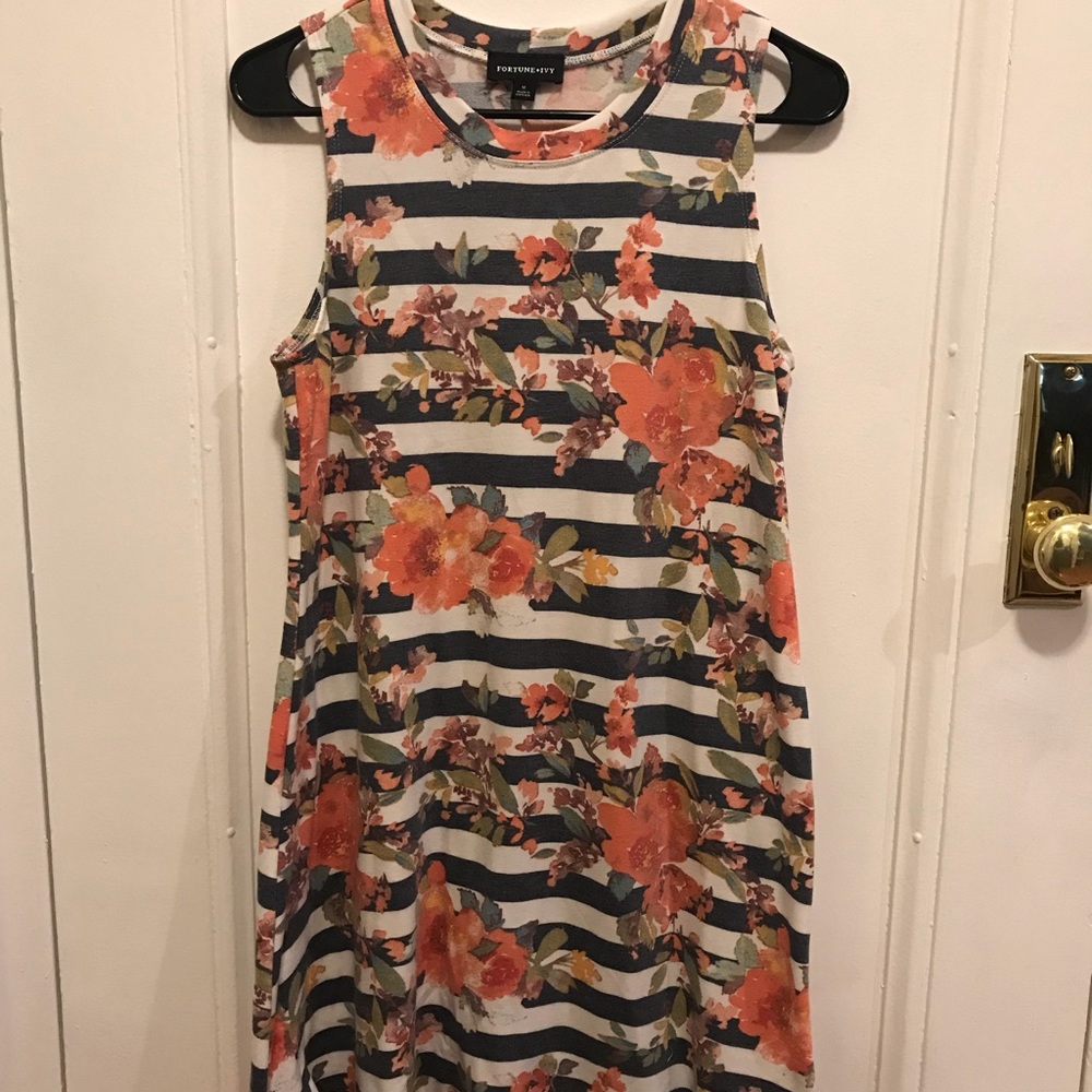 Blue and white stripped dress with flower design.